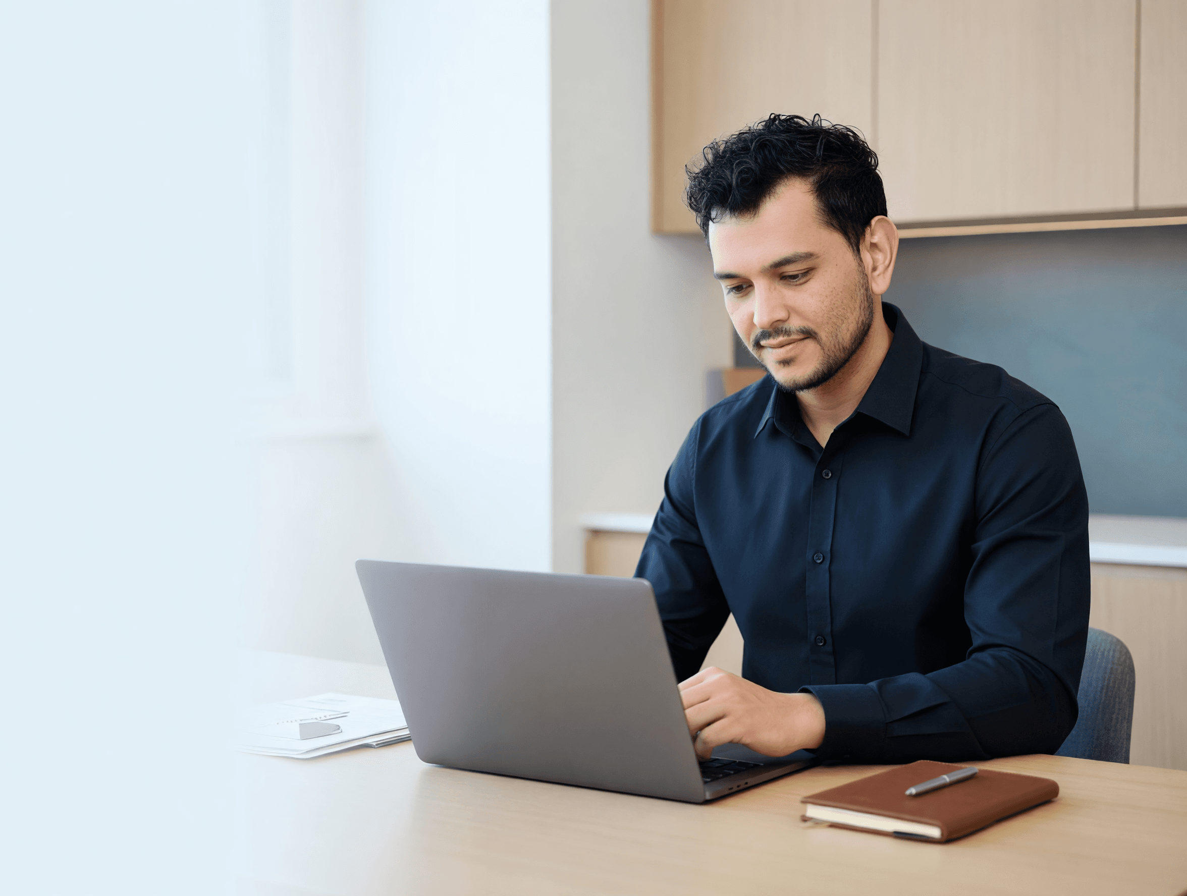 NOCAP advisor working in a bright office